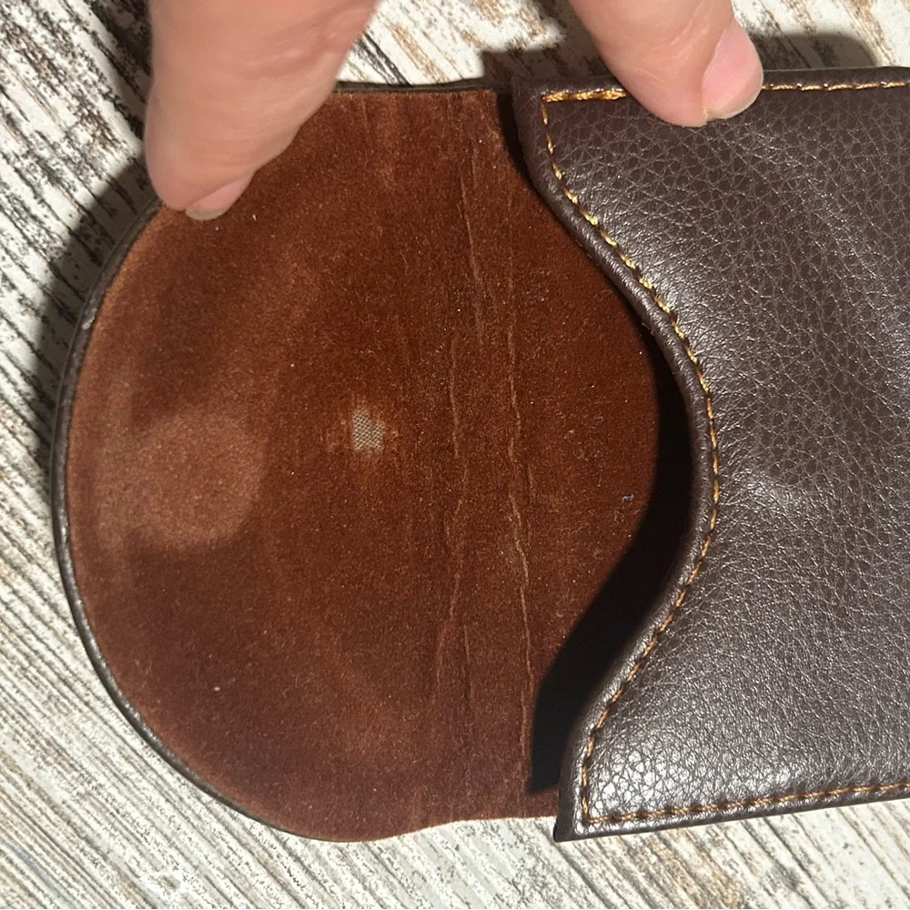 Brown Ocadux Leather Business Card Holder is a compact, pocket-sized wallet